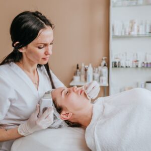 esthetician performing skincare treatment