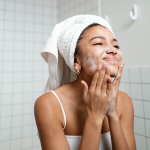 woman washing face